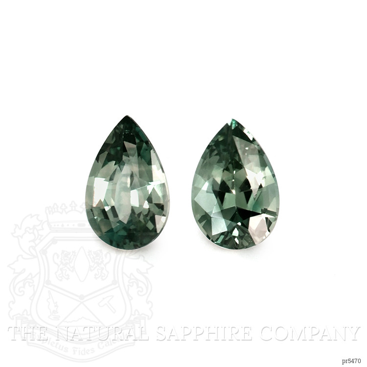 Very pleased with my pear-shaped green sapphire pair!