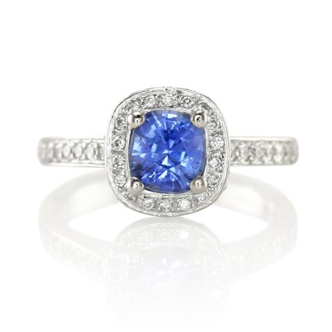 A Beautiful Blue Sapphire and Pave Diamond Ring