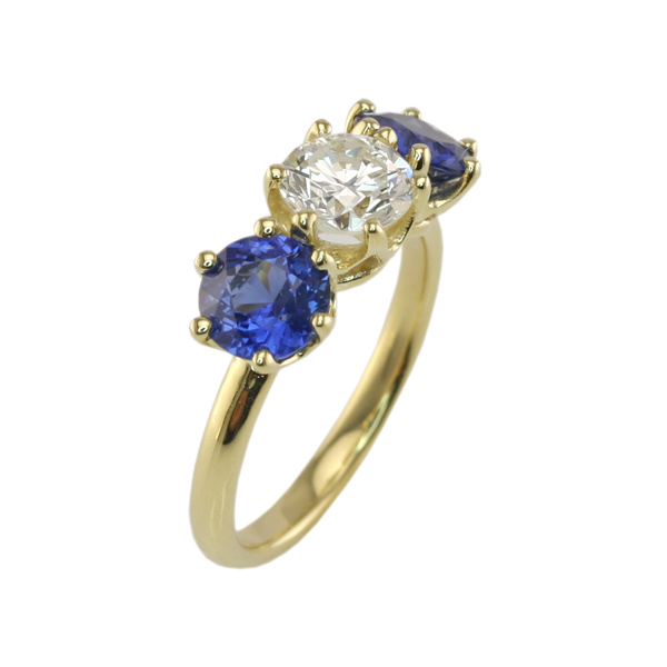 Antique-Inspired Sapphire and Diamond Three-Stone Ring