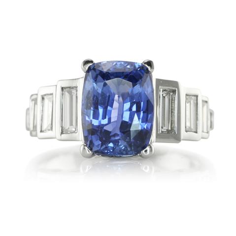 An Impressive Cushion Cut Blue Sapphire and Diamond Ring