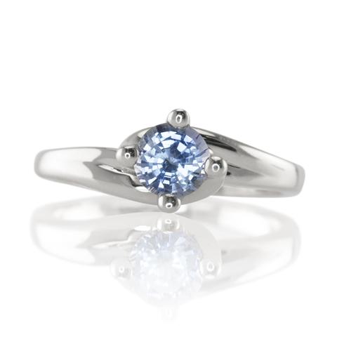 An Enchanting Light Blue Sapphire Twist Ring